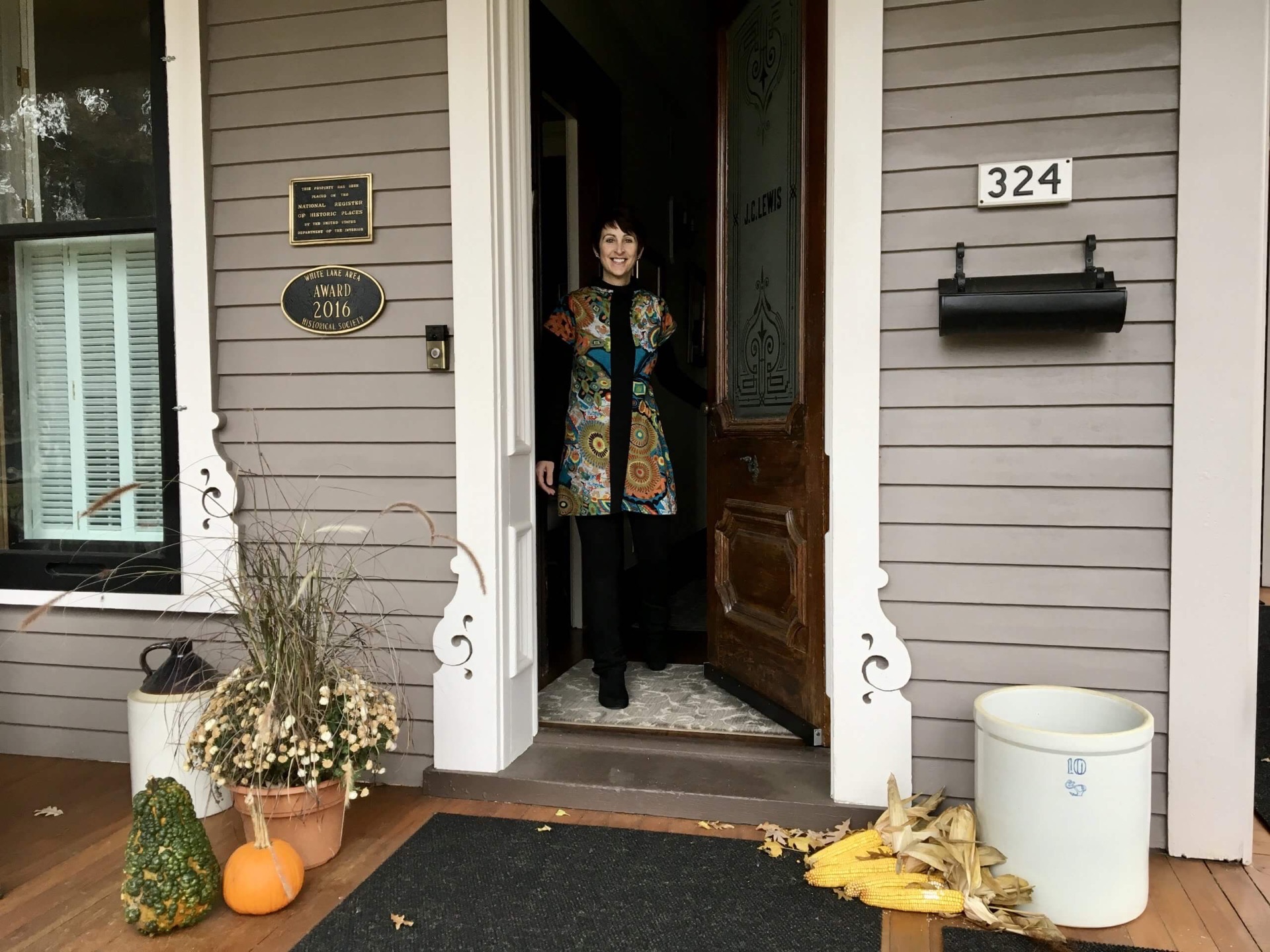 Innkeeper Debi Hillebrand of Lewis House B&B opens the door to greet guests