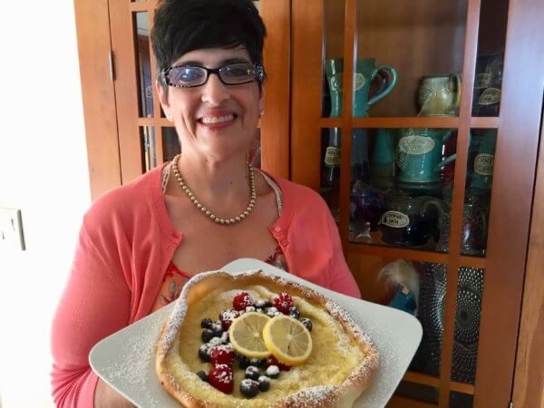 Kim prepared individual Dutch Babies for each guest when she job shadowed the innkeepers at Adventure Inn Bed and Breakfast.