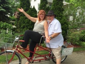 Couple on a Bicycle Built for Two