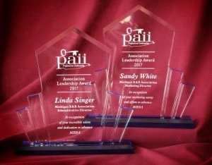 Two awards given by PAII to MBBA’s Linda Singer and Sandy White