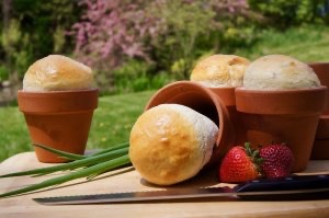 Loaves of bread bake in four-inch flower pots
