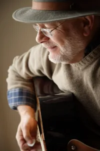Terry Altman playing guitar