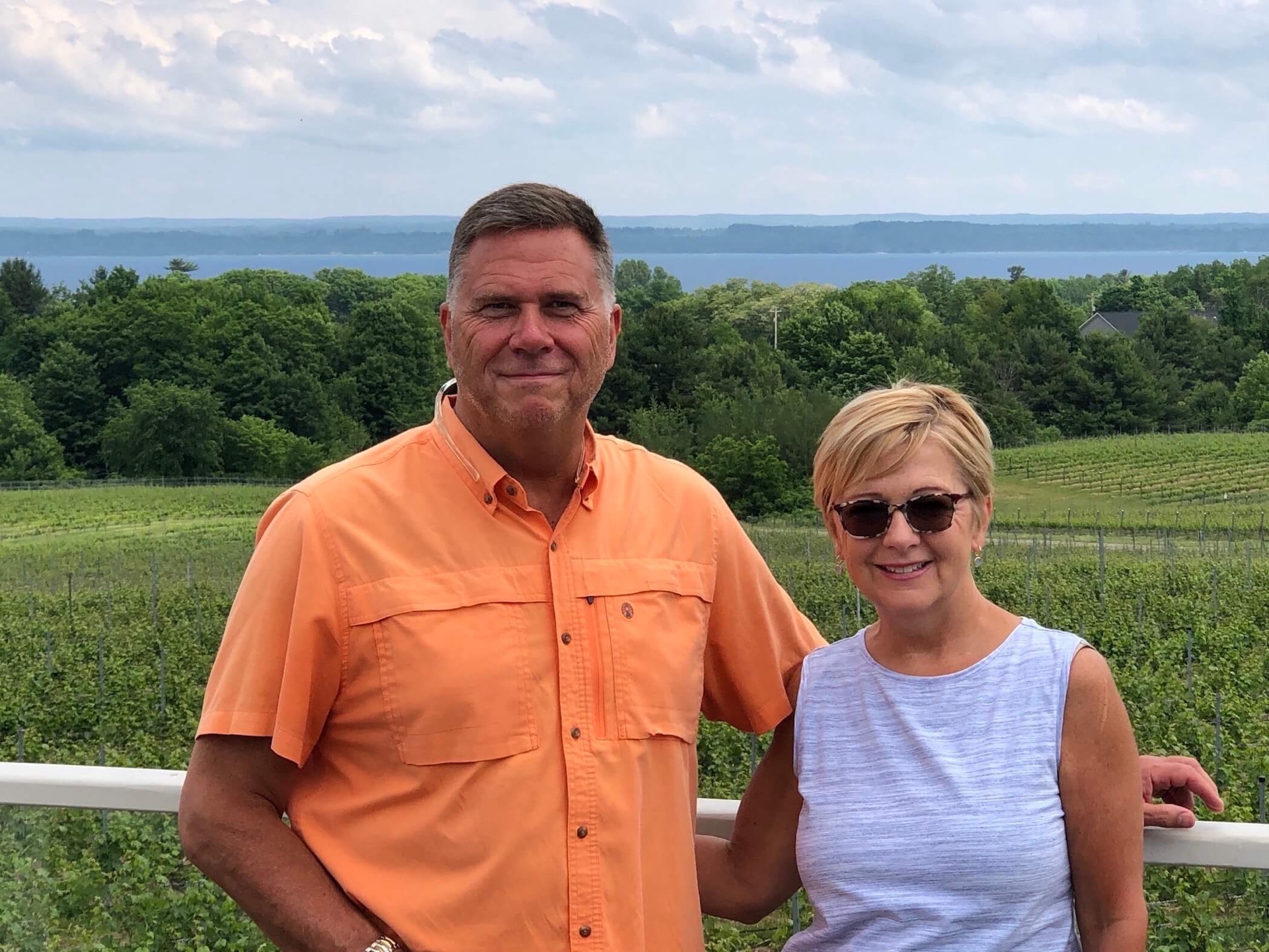 Mike and Liz Clancy with Grand Traverse Bay in the distance