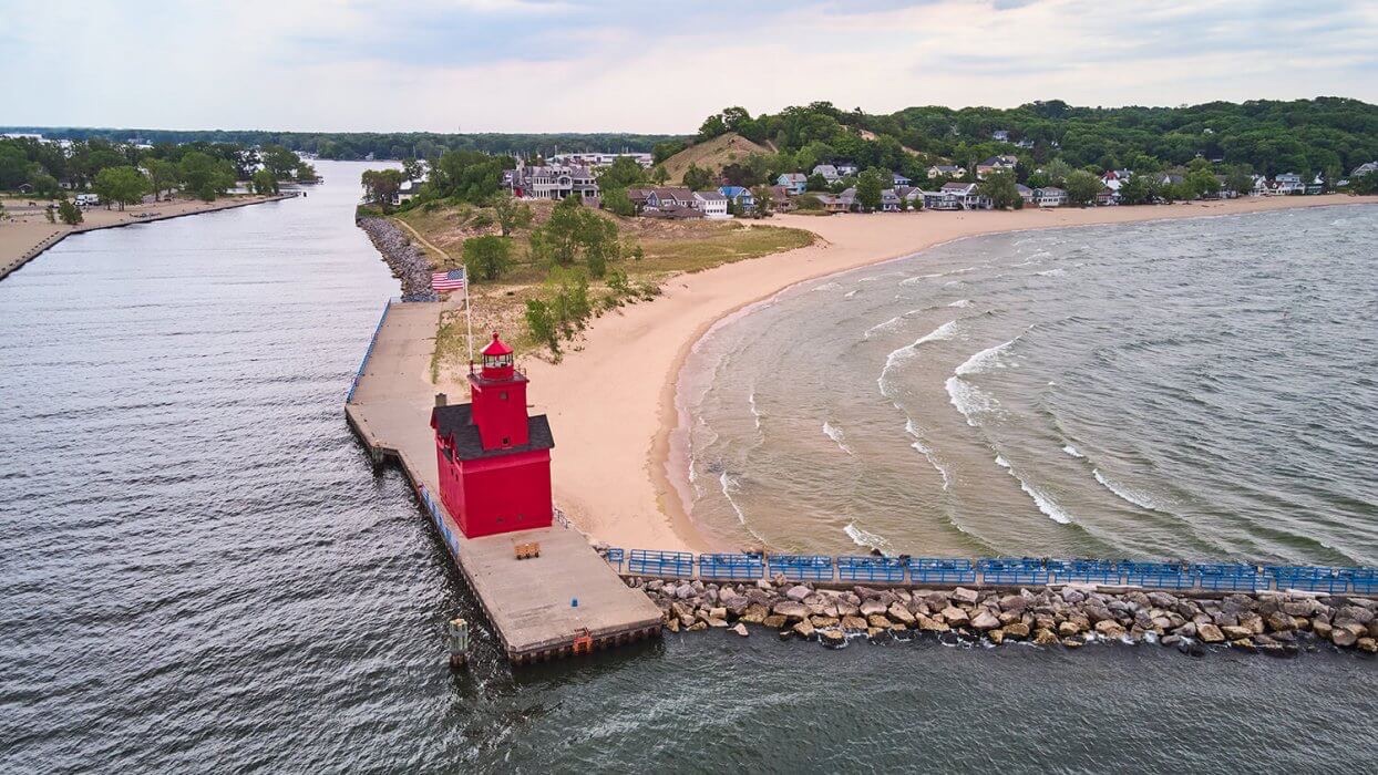Aerial of Holland Harbor Light on a windy day.