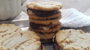 Peanut butter and chocolate ganache sandwich cookies as served at Lamplighter B&B of Ludington