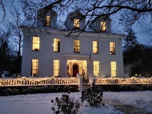 Judson Heath Colonial Inn all lit up for the holidays
