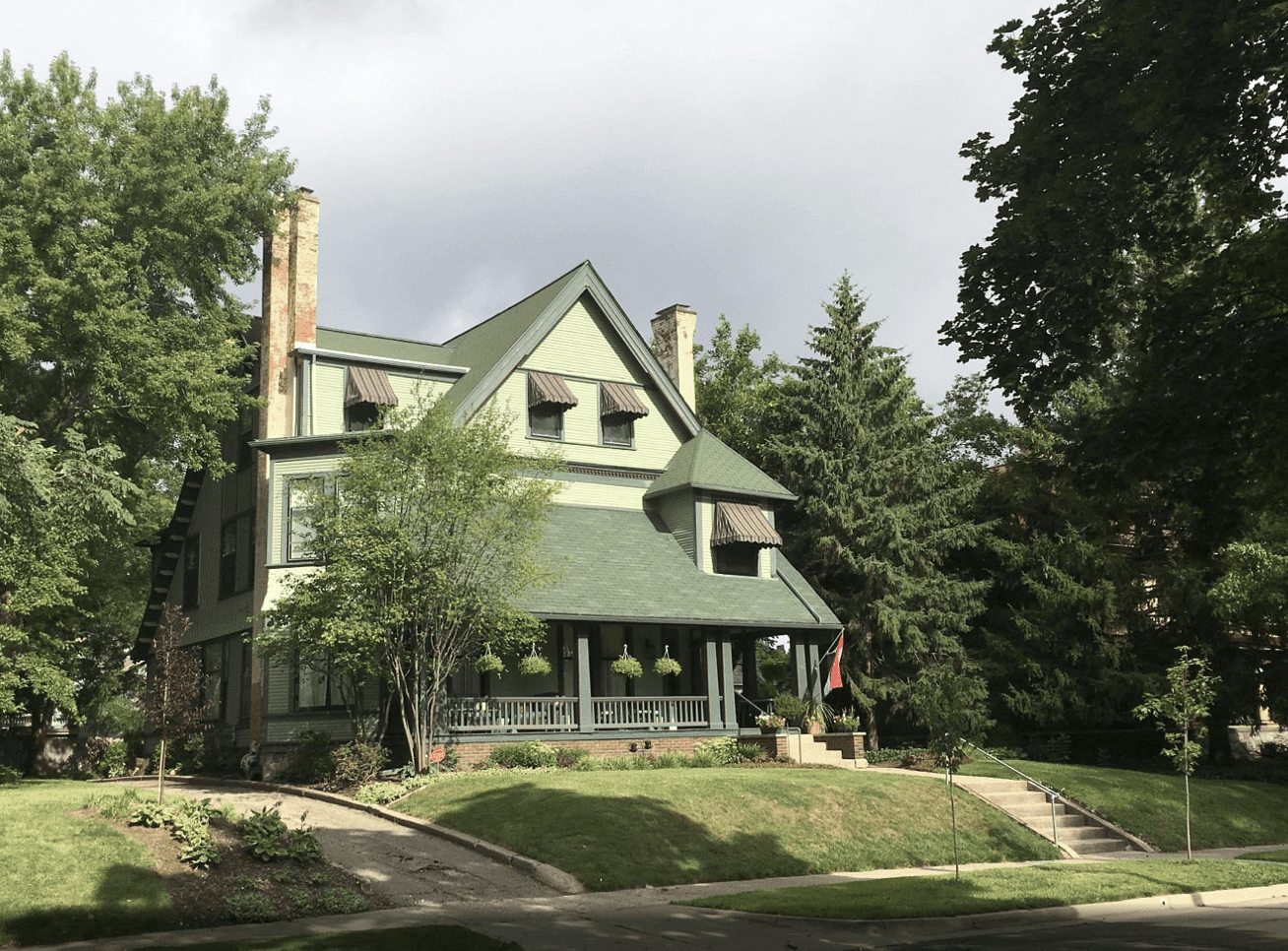 A green Victorian home in Grand Rapids