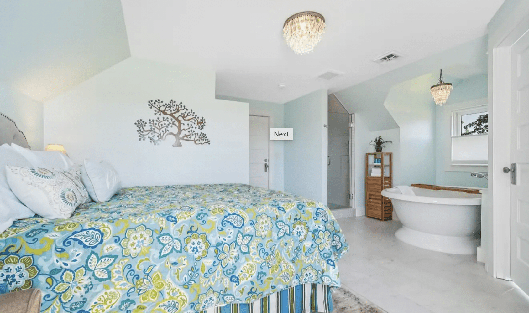 Queen bedroom with a soaker tub