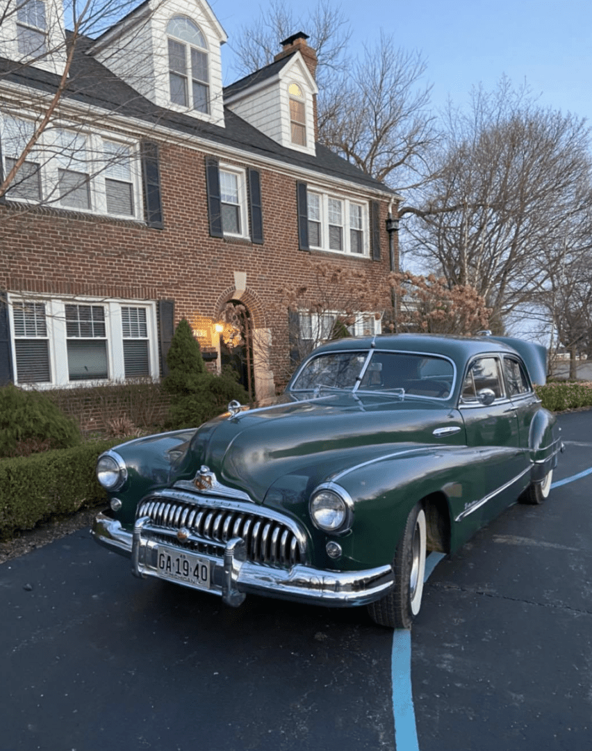 a Buick Roadmaster built in Flint, 1948, parked in front of the Knob Hill Bed and Breakfast