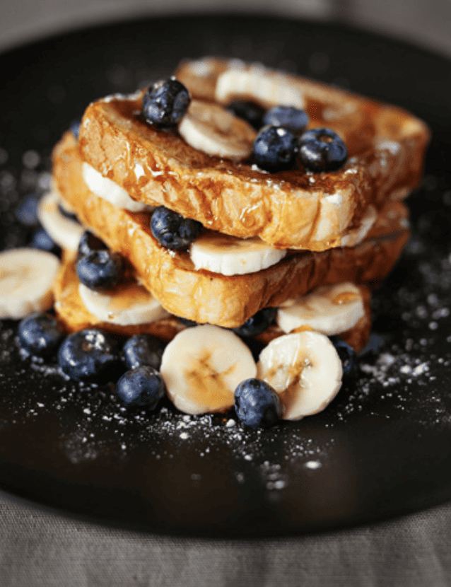 Stacked French Toast with bananas and blueberries