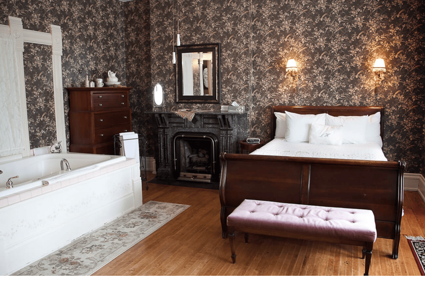 Dark Cherry Sleigh Bed with decorative wallpaper
