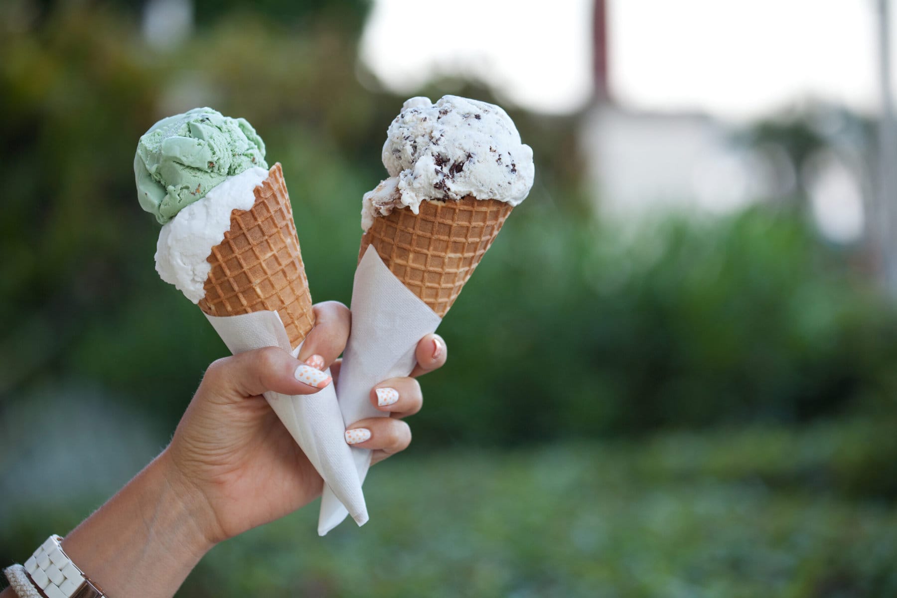 Two colorful ice cream cones