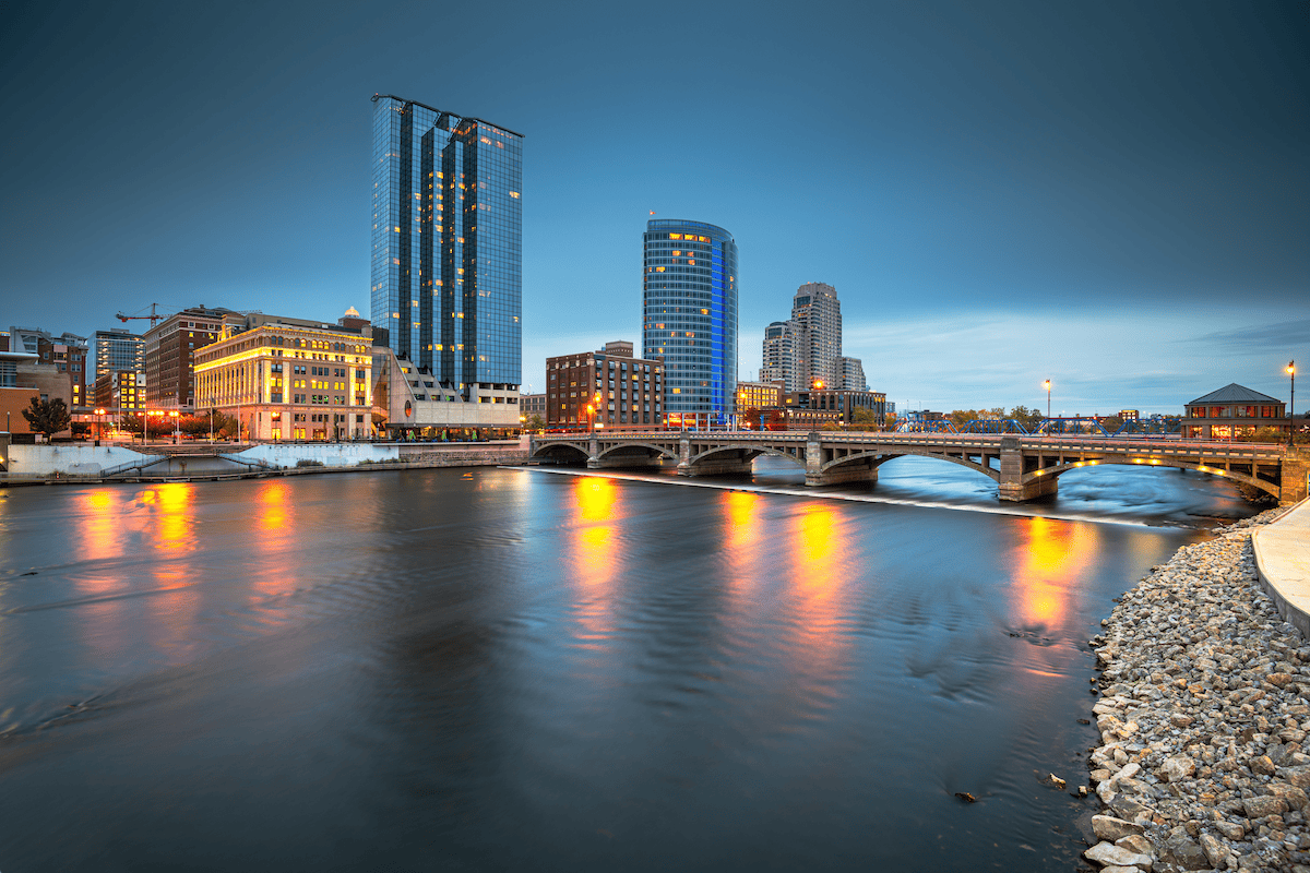 Grand Rapids at night with views of the river & bridge