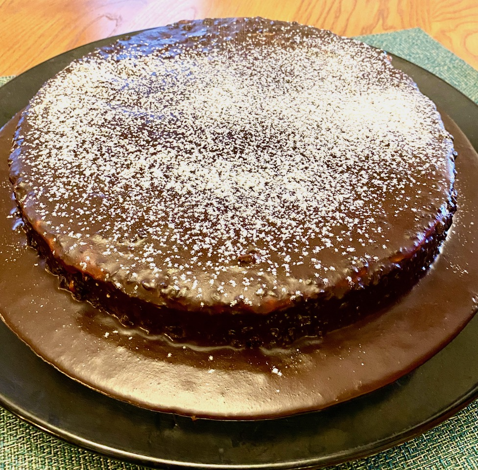 Chocolate cake with white sugar powder on top