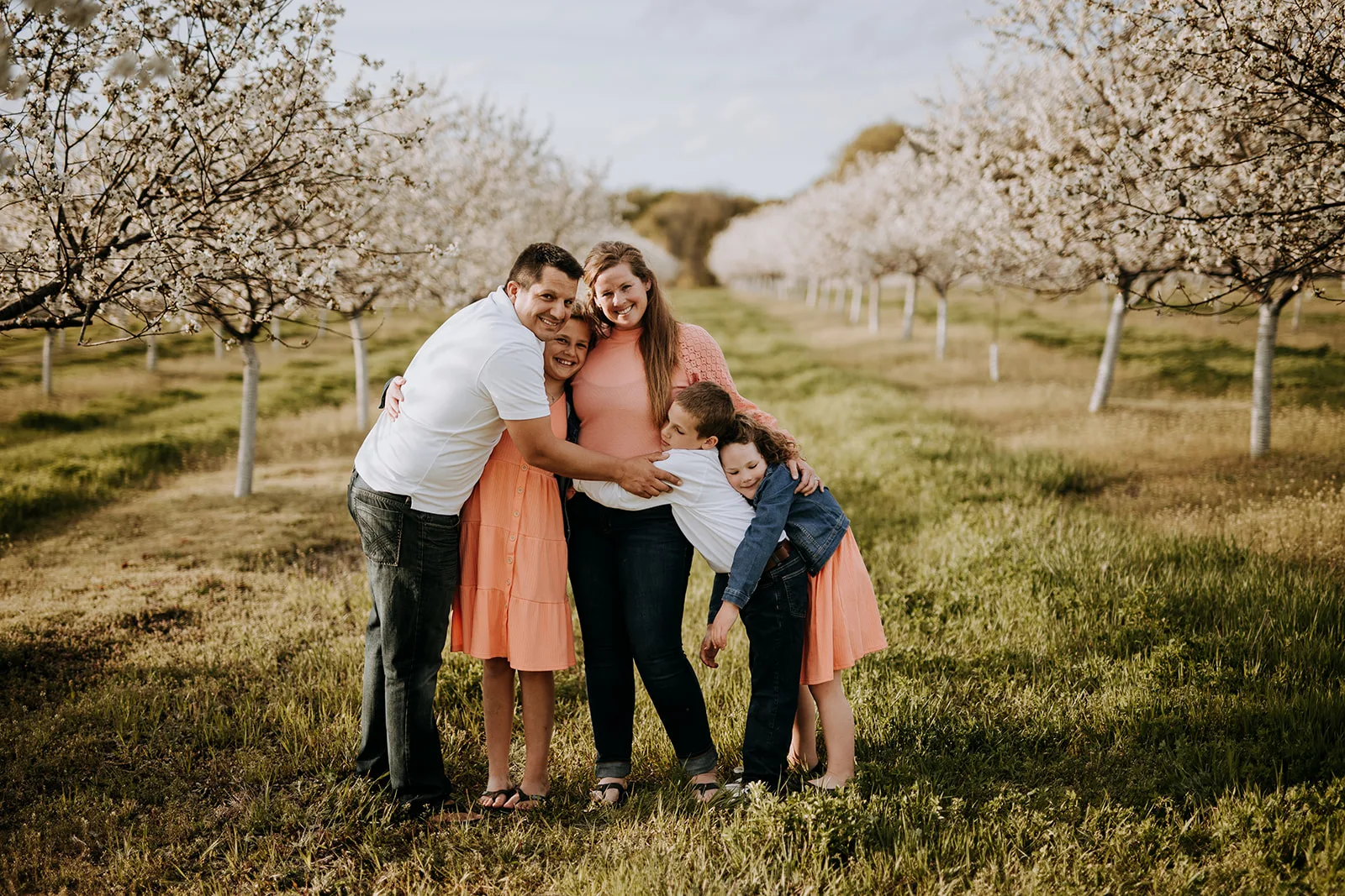 Roming Roosr family in a cherry orchard
